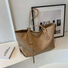 Stylish winter tote bag in leather with spacious interior and sturdy handles, perfect for winter fashion.