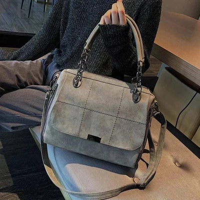 Casual high-quality canvas shoulder handbag for everyday use with sturdy straps and spacious design.