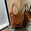 Women's single shoulder suede tote bag, modern and versatile design, 2024 fashion.