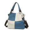 Canvas retro bag, stylish and spacious women's hand/shoulder accessory, durable and minimalist design.